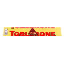 Шоколад молочний з медово-мигдальною нугою Toblerone к/у 4х25г