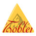 Шоколад молочний з медово-мигдальною нугою Toblerone к/у 4х25г