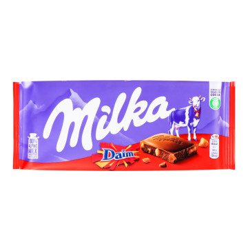 Шоколад молочний зі шматочками хрумкої карамелі з мигдалем Milka м/у 100г