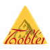 Шоколад молочний з медово-мигдальною нугою Toblerone к/у 4х25г