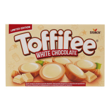 Цукерки з лісовим горіхом, горіховим кремом і білим шоколадом в карамельній чашечці Toffifee к/у 125г